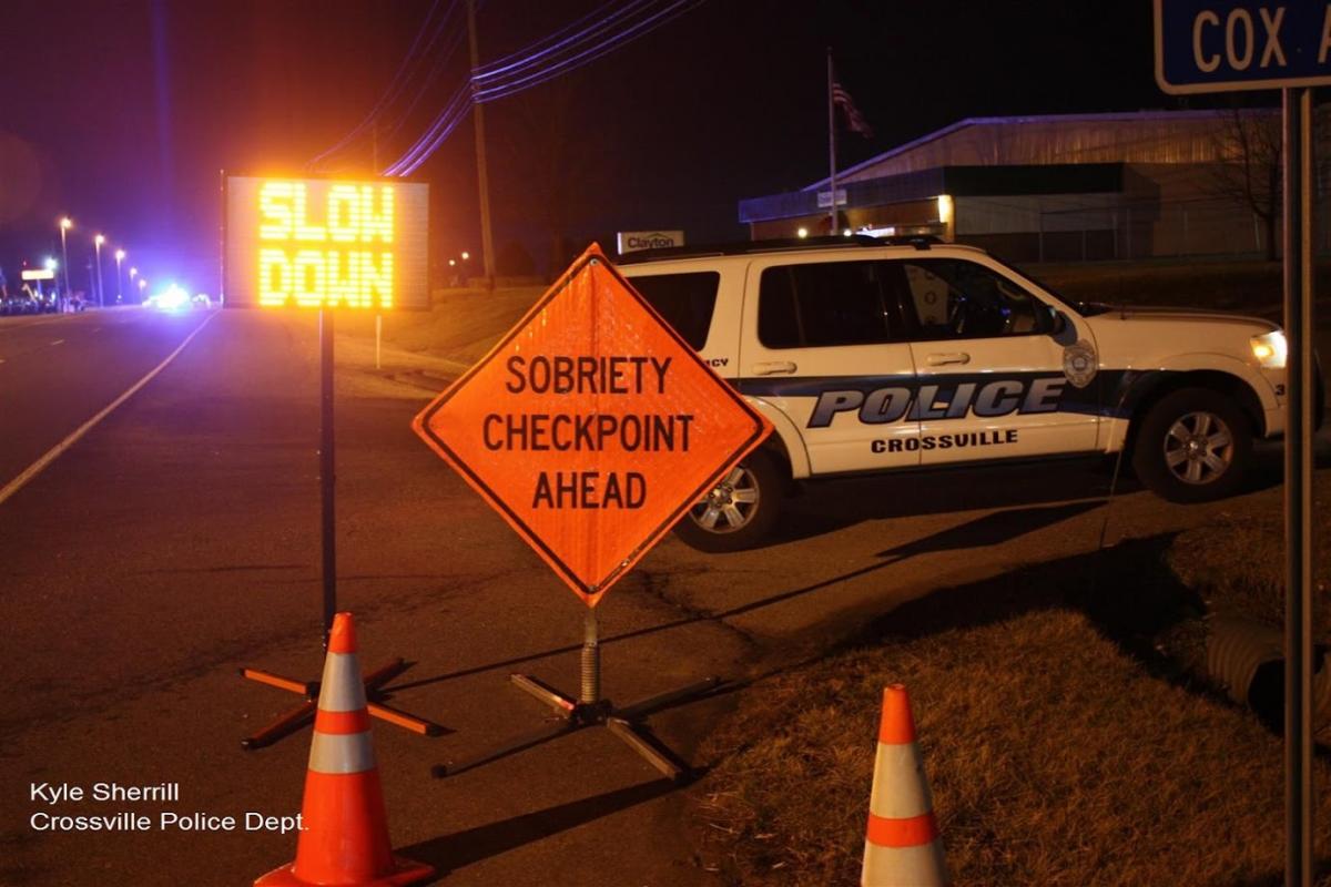 Photo of sign that reads Sobriety Checkpoint Ahead